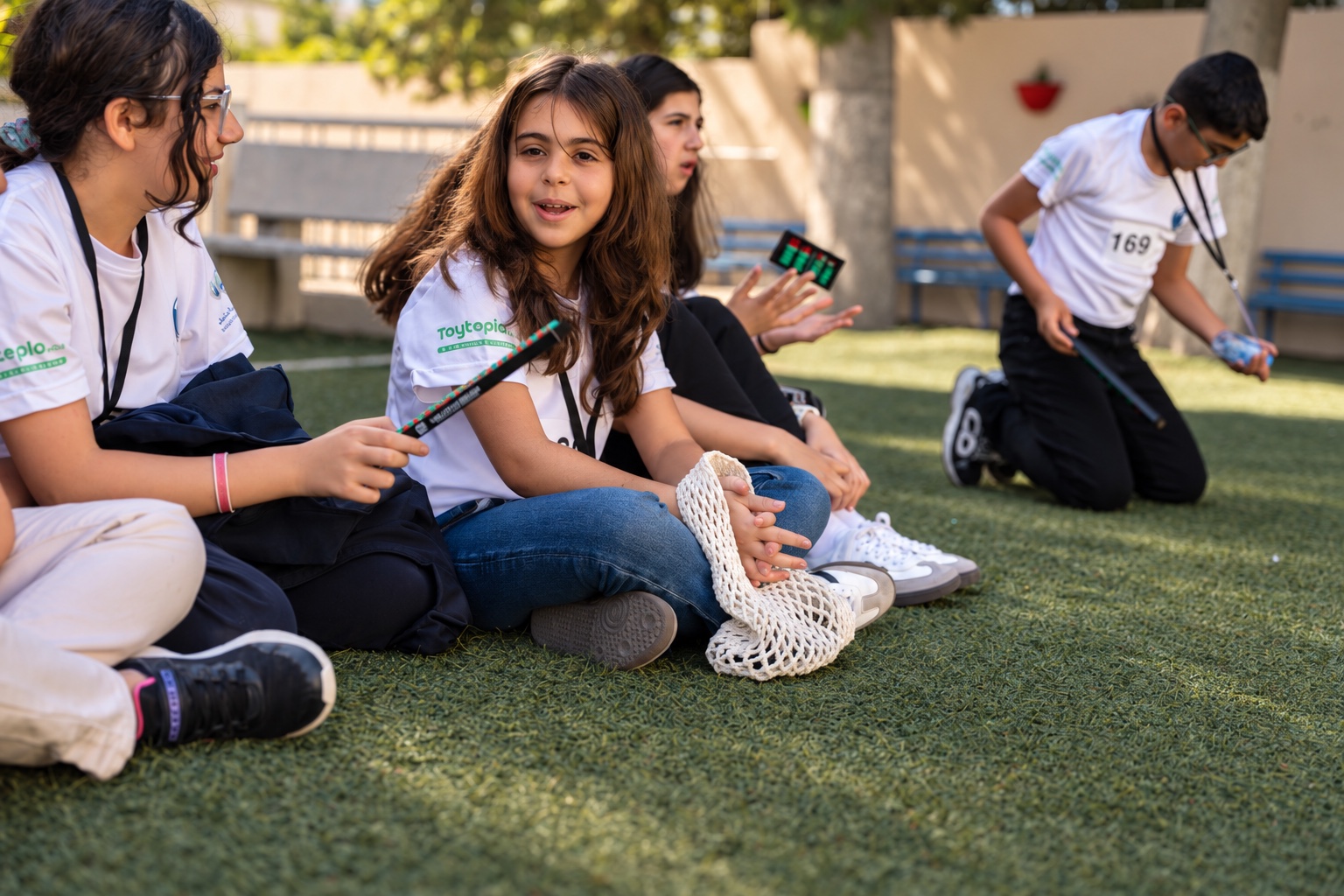 Students sharing a group activity during a Little Genius event